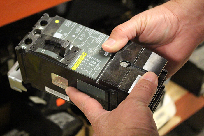 Jeff Dilandro examines equipment