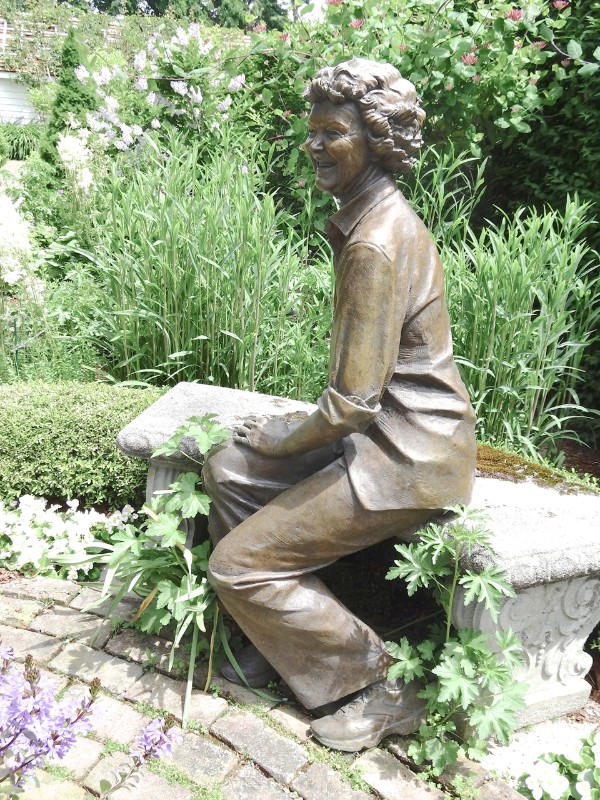 Bronze sculpture of "Nana" in her garden by her house on her daughter's property. She lives on in her garden.