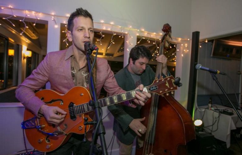 Spaghetti Westeners, Dante Mazzetti on guitar and Joe Haines get people rocking