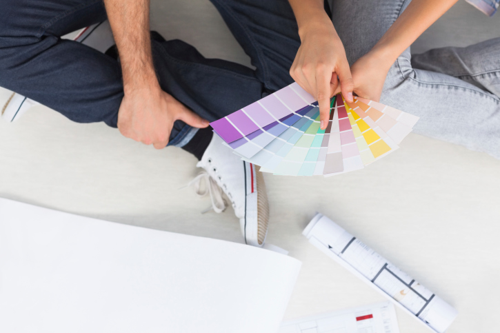 Couple looking at color charts