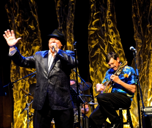 The Hoodoo Loungers filled the theater with the upbeat sounds of New Orleans Mardi Gras party music.