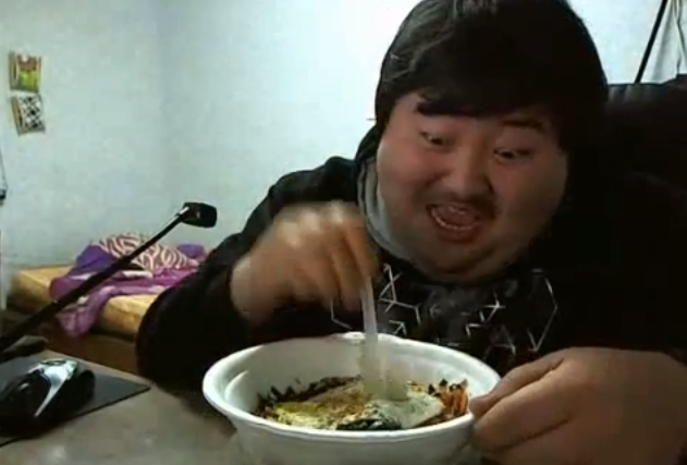 Korean Guy Eating Soup