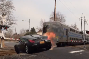 Train smashes into a car.