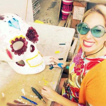 Allison Eden Goldenstein painting her Bigg Head Skull