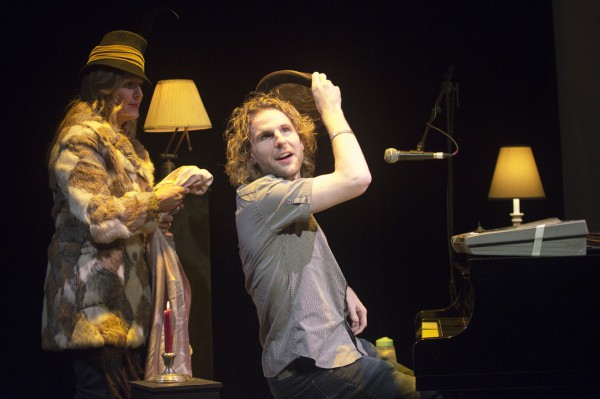 Nancy Atlas setting Danny Kean free of his Merlin the wizard robe as he settles in for an evening at the piano