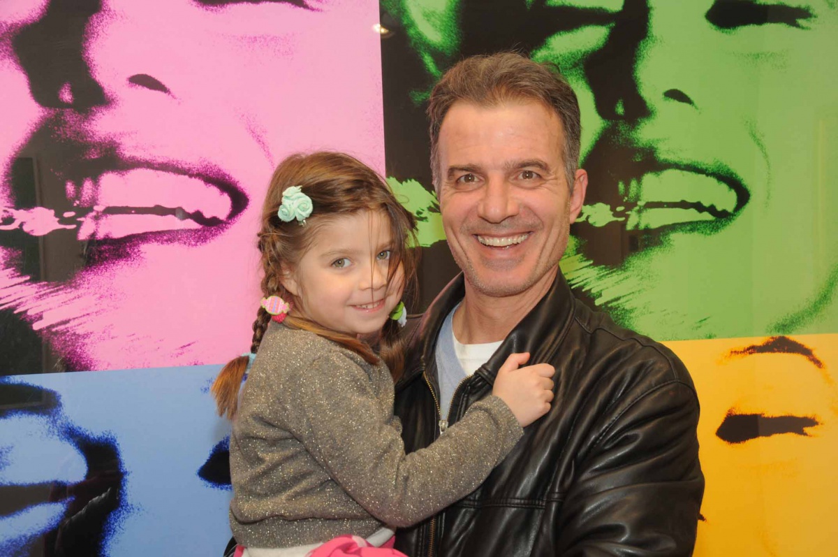 Lia and Haim Mizrahi in front of Bert Stern's "Marilyn Monroe"