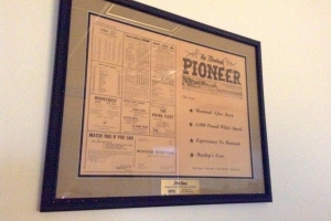 The first edition of the Montauk Pioneer hangs over Dan Rattiner's desk.