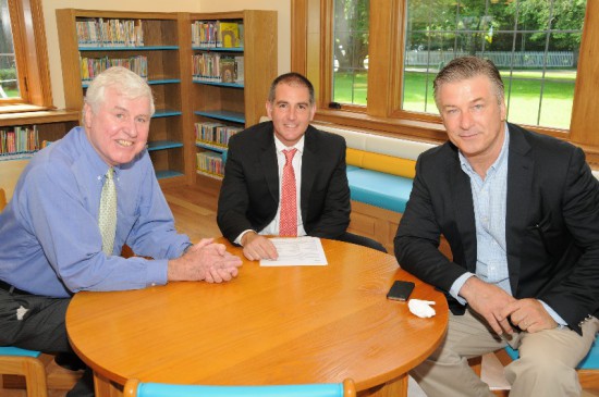 East Hampton Library Board Chairman Tom Twomey, library director Dennis Fabiszak and Alec Baldwin.