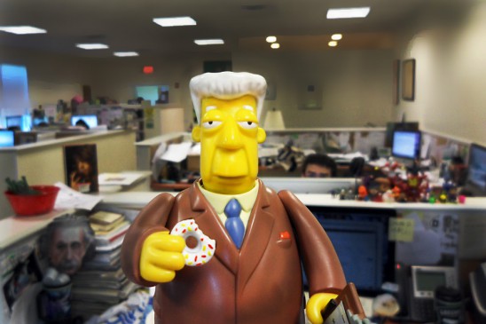 Kent Brockman celebrates National Doughnut Day with aplomb