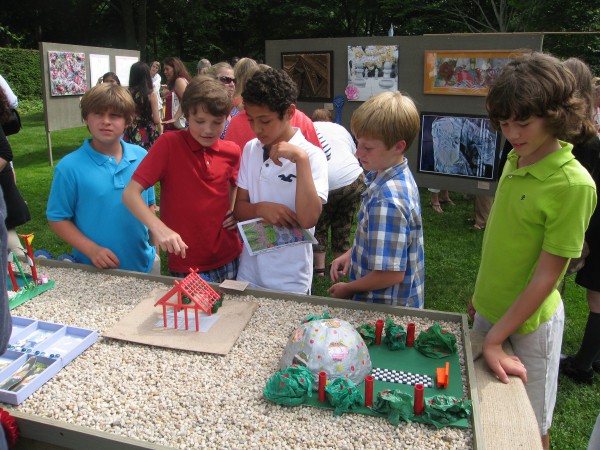 Middle schoolers enjoying curated Student Annual VII show