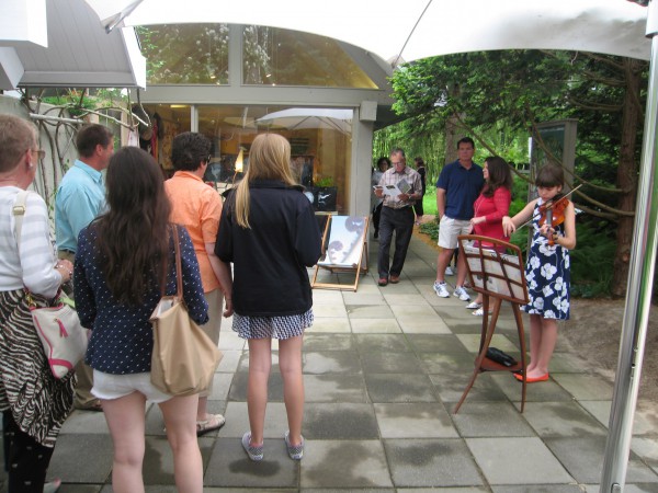 Nika Lea Tomicic, 5th grade, Southampton Intermediate student, greets guests as they enter playing viola JS