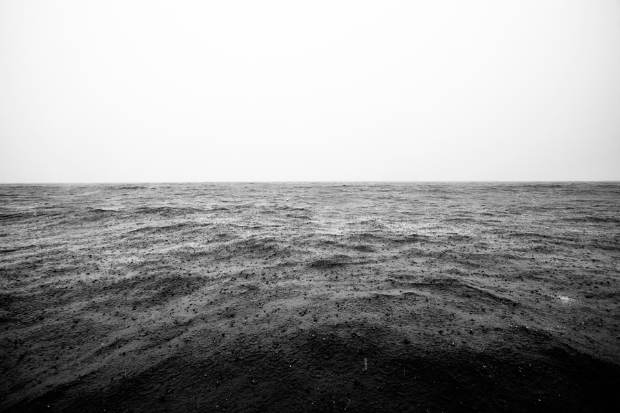 Rain falling on water at sea