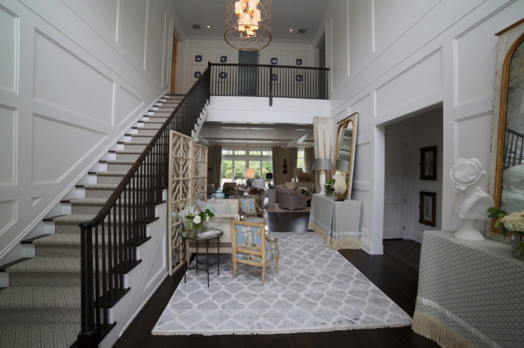 Foyer by  The Rinfret Group.