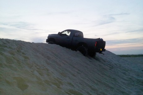 Truck stuck in sand near Flying Point Beach in Water Mill