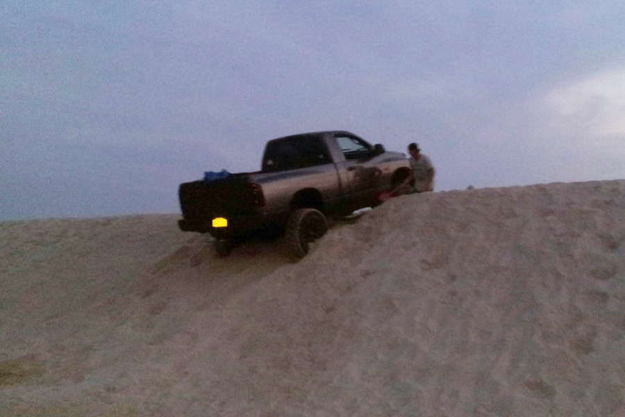 Truck stuck in sand near Flying Point Beach in Water Mill