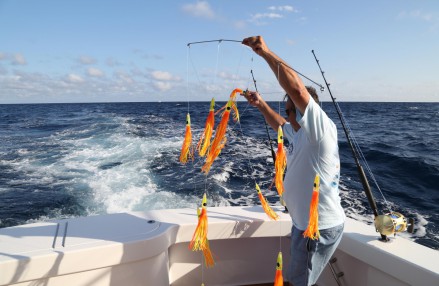 Casting the lures from a the 2015 55-foot Viking Convertible “Dealers Choice.” Photo credit: Cully/EEFAS
