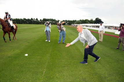 Xavier Vey tosses the ball at the Opening Day polo match