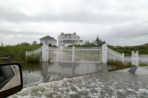Dune Road flooded beyond residents' gates in East Quogue on Wednesday