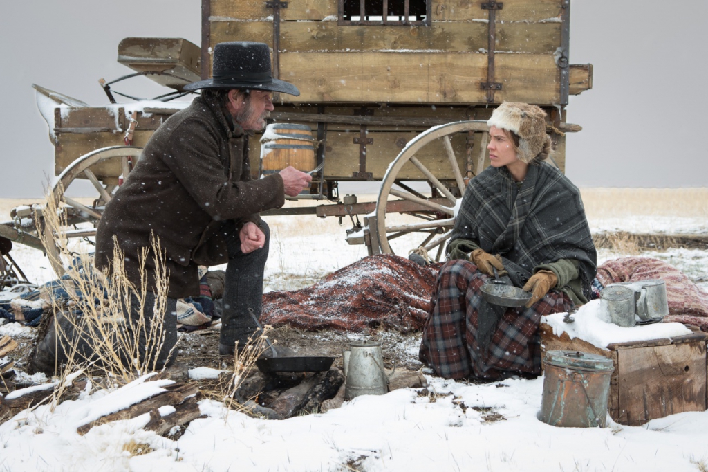 Tommy Lee Jones as George Briggs and Hilary Swank as Mary Bee Cuddy in "The Homesman."