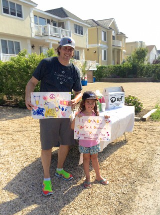 Story Sinelli and her dad Jeff set up her first ever lemonade stand in Westhampton Beach.