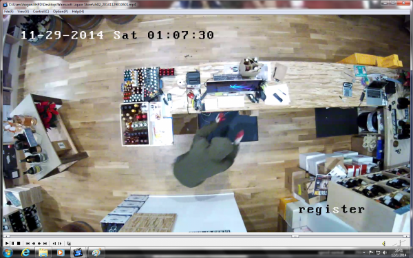 The suspect burglarizes a liquor store in Wainscott. Photo credit: Courtesy EHTPD