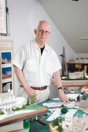 Gary Lawrance works on an architectural model. Photo credit: Doug Young