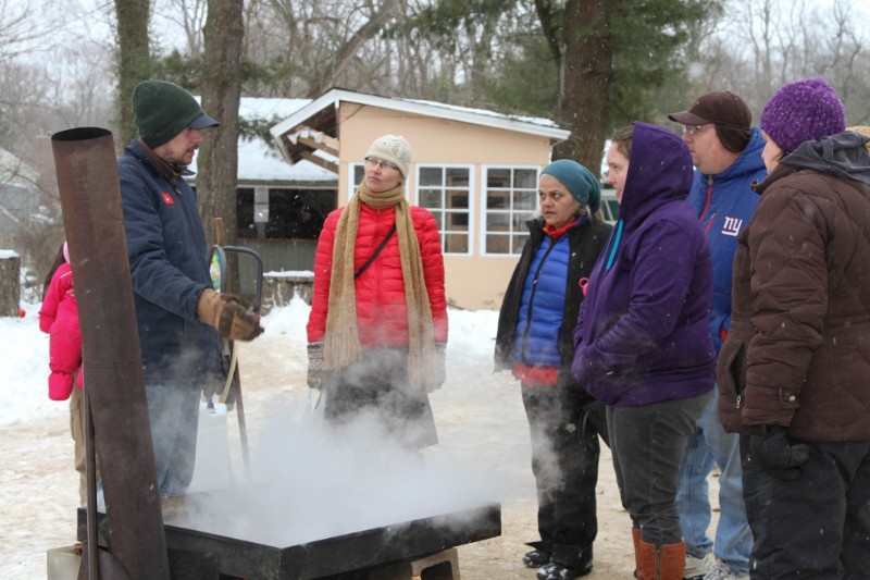 Maple sugar being boiled down to make maple syrup