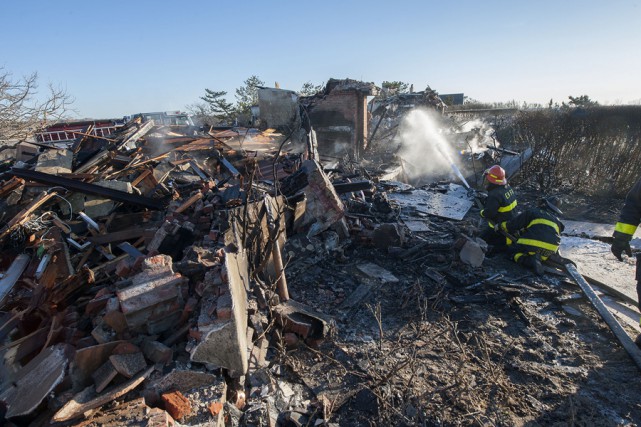 At 2:35 p.m. on Wednesday, March 18th, 2015, members of the East Hampton Fire Department responded to the Morton residence for a report of a structure fire. First arriving units found the structure, which was under renovation at the time, heavily involved with fire. Mutal aid was called from the Montauk, Amagansett, Springs, Sag Harbor, Bridgehampton, Southampton and Hampton Bays Fire Departments, and the North Sea Fire Department was called to stand by at the EHFD headquarters. Cold temperatures, a strong wind and water supply challenges made fighting the fire difficult, and eventually heavy equipment was called for to knock the chimneys over and remove debrisi so that all remaining pockets of fire could be extinguished. I was not until well after that 9:00 p.m. that evening that all units were fully back in service. It was suspected that roofers installing new flashing were to blame for the fire, but the East Hampton Village Fire Marshal's office responded and was on scene to determine the fire's cause and origin.