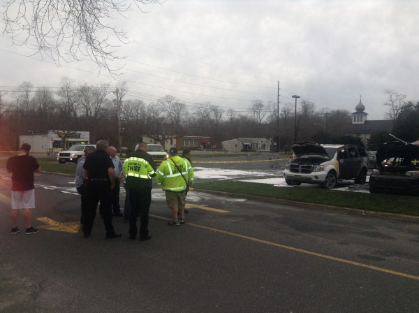 Car fire and explosion in Eastport King Kullen shopping center parking lot destroyed three vehicles and sent a man to the hospital. Photo credit: Brendan J. O'Reilly