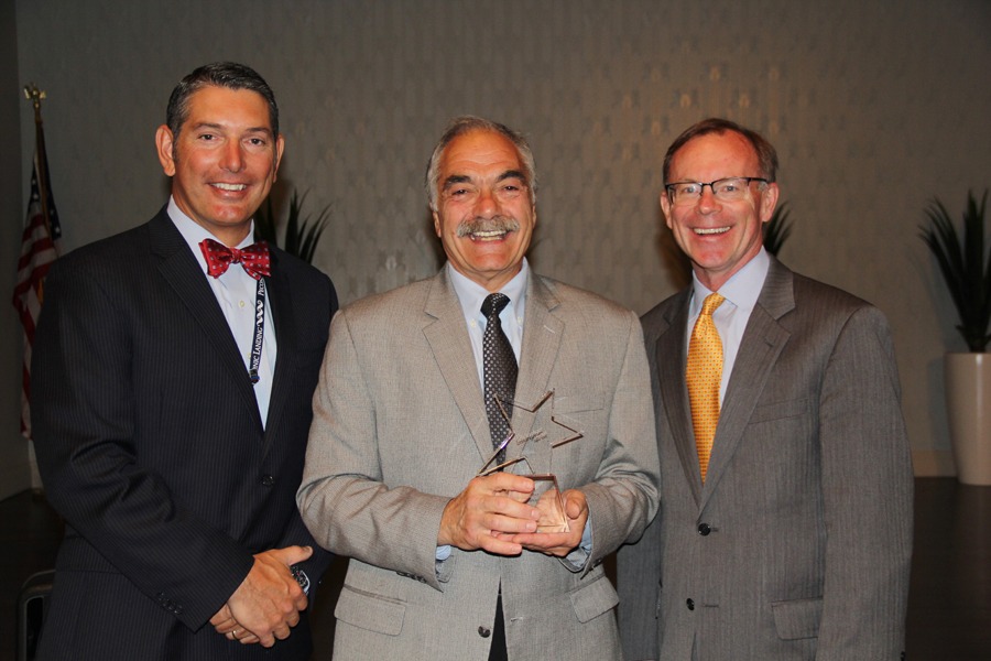 The Innovation of the Year award was presented to Peconic Landing President/CEO Robert J. Syron by LeadingAge President/CEO James W. Clyne Jr. 