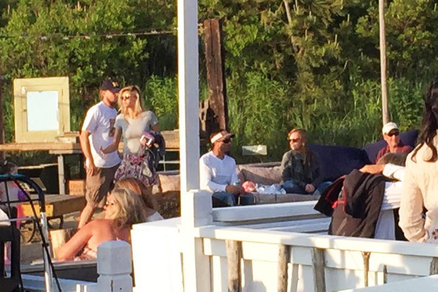 Leonardo DiCaprio and Kelly Rohrbach at Surf Lodge in Montauk