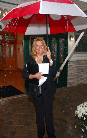 Barbara Hock of B. Hock Events is ready for anything—even a downpour during the ceremony.