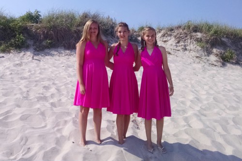 The i-tri Grils celebrate at Coopers Beach