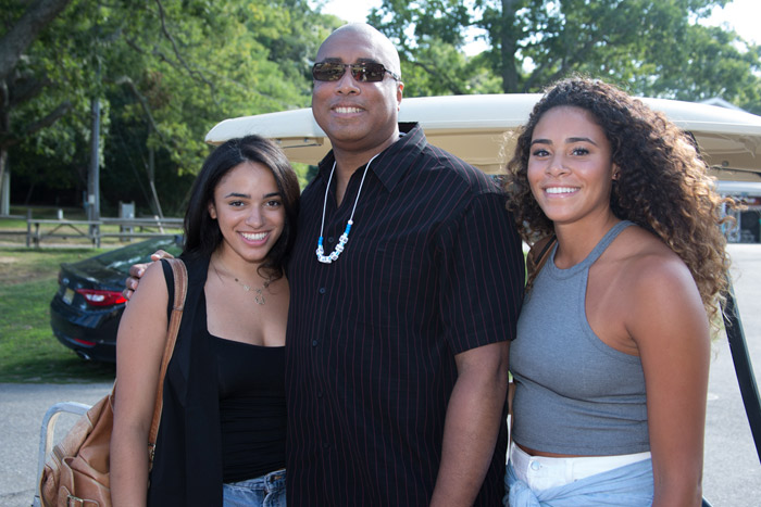 Bernie Williams and his two beautiful daughters Beatriz and Bianca will hand out instruments to Camp Adventure.