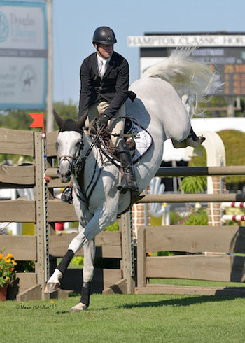 Shane Sweetnam of Ireland and Eregast Van't Kiezelhof turned in the winning performance in the $10,000 Bright Side Farm Open Jumper at the Hampton Classic.