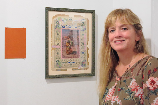 Kelyann Alder standing next to her side show printKelyann Alder standing next to her side show print