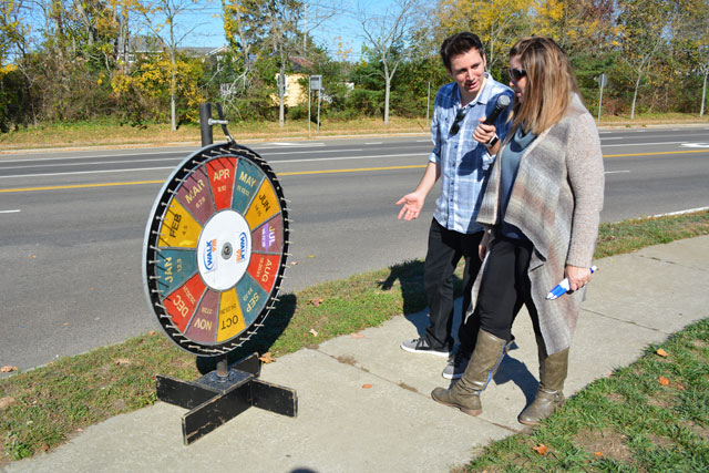WALK 97.5 brought a prize wheel and gave out tickets and museum admissions to winners. 