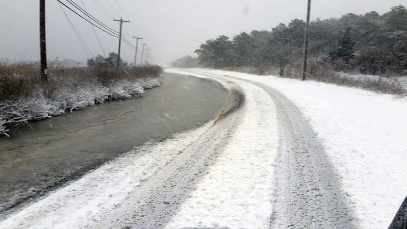 Cranberry Hole Road flooded to the center line on Monday morning
