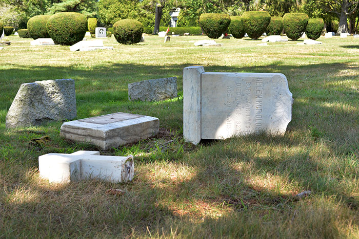 Broken headstone at Sacred Hearts cemetery