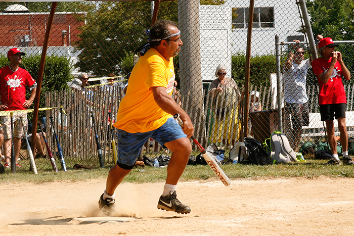 Eric Ernst gets a hit at the Artists & Writers Game