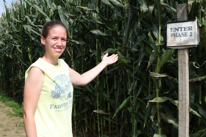 Melissa Pombo invites patrons into the Corn Maize at Fairview Farm in Mecox