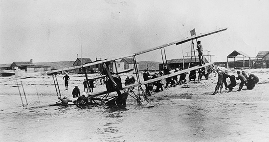 Bi-plane getting hauled ashore from Fort Pond in Montauk