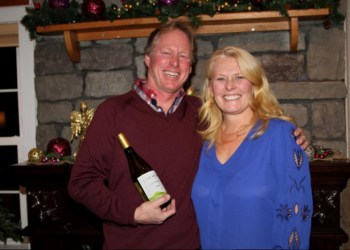 Ron Goerler and wife Joanne of Jamesport Vineyards holding a selection of wine from his vineyard