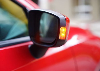 The blinking lights in question were on both sides of the car