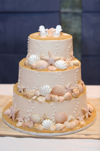 A beach-themed wedding cake