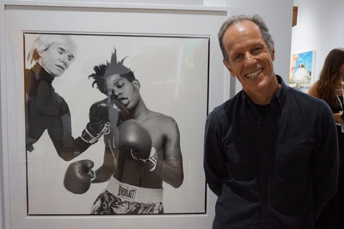 Michael Halsband with his photo of Andy Warhol and Jean-Michel Basquiat