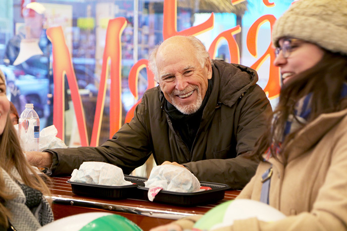 Jimmy Buffett hands out cheeseburgers in anticipation of "Escape to Margaritaville"