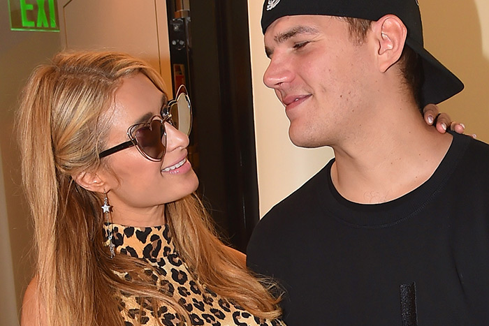 Paris Hilton and Chris Zylka in Miami last month