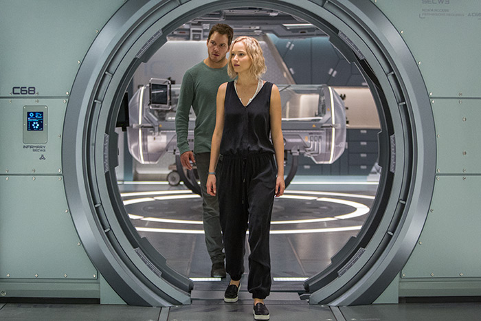 Jim (Chris Pratt) and Aurora (Jennifer Lawrence) try to make sense of this mess in Columbia Pictures’ Passengers