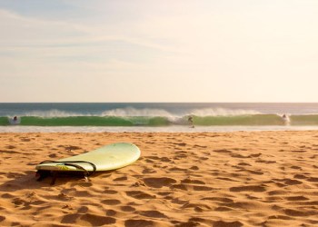 Surfboard on beach